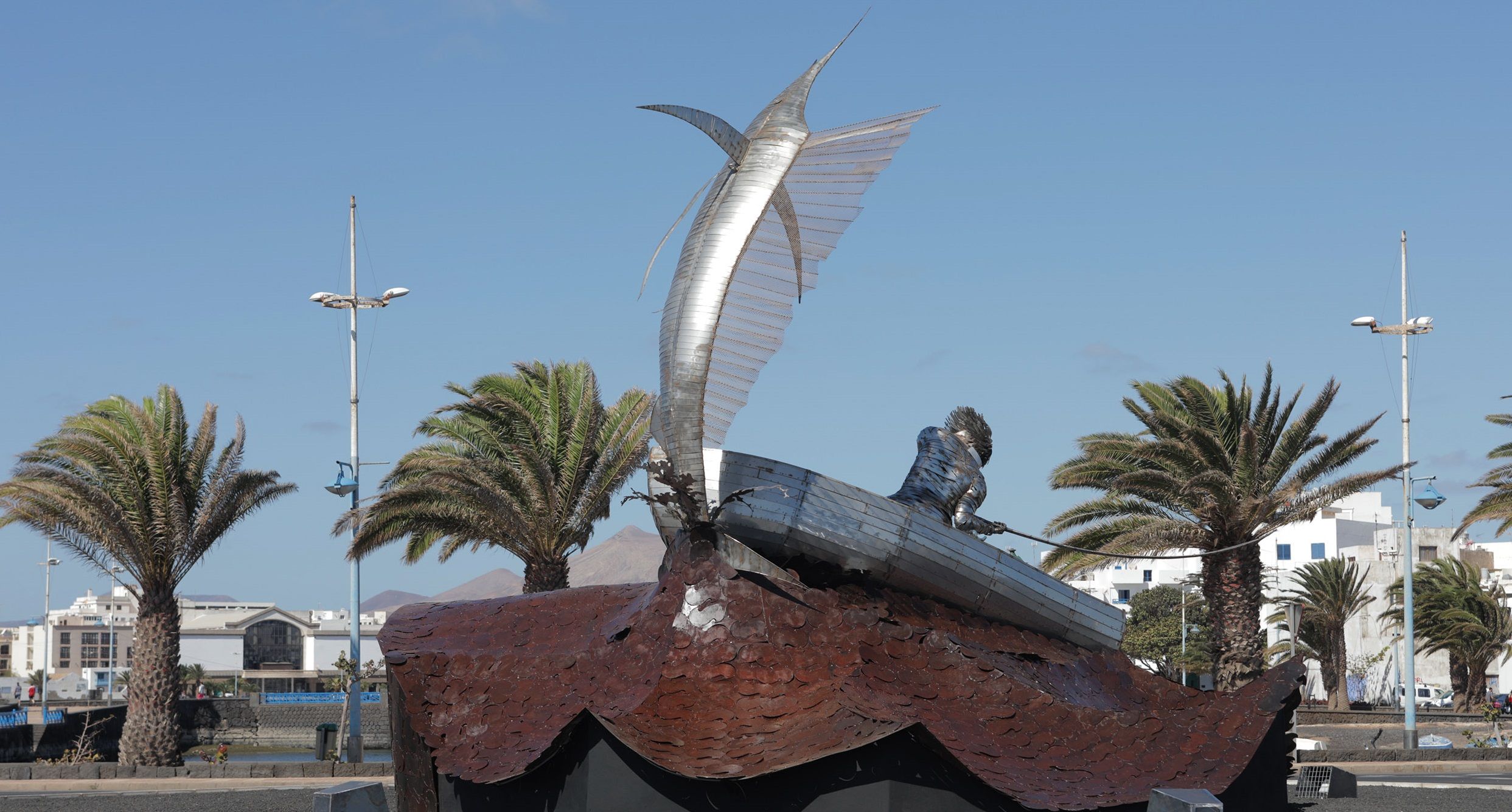 Escultura Pescador con marlín